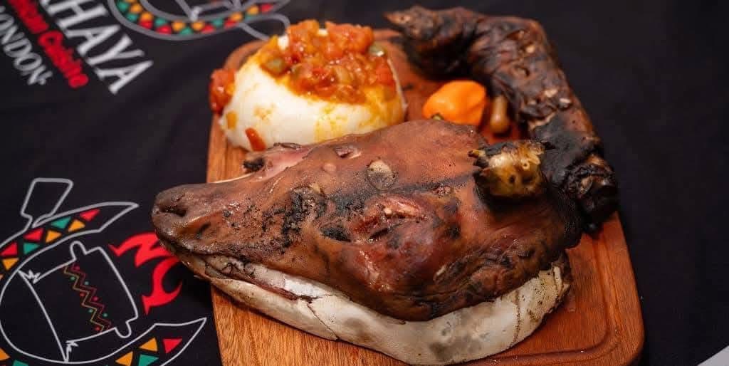 Intloko — slow-cooked sheep head served with pap and chakalaka