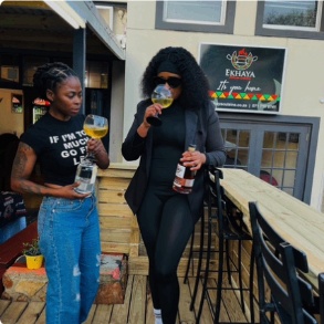 Ladies enjoying drinks at the Ekhaya bar