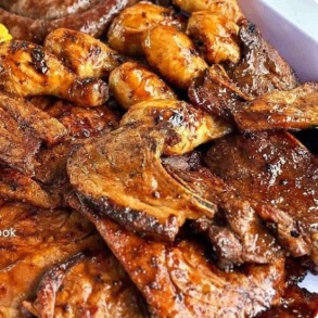 Grilled chicken wings and chops fresh from the braai